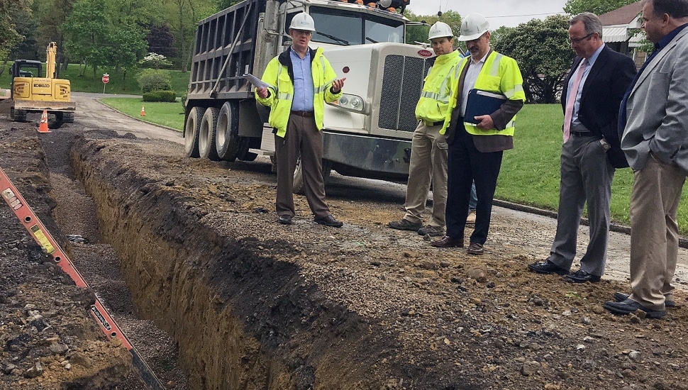 Aqua crews at a worksite replacing water mains/pipes.