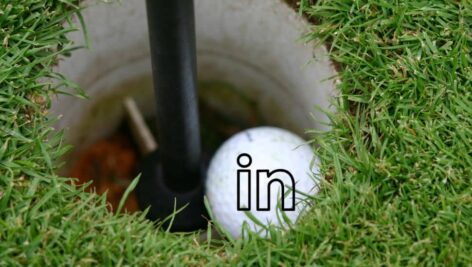 LinkedIn insignia Golf Ball in the hole.