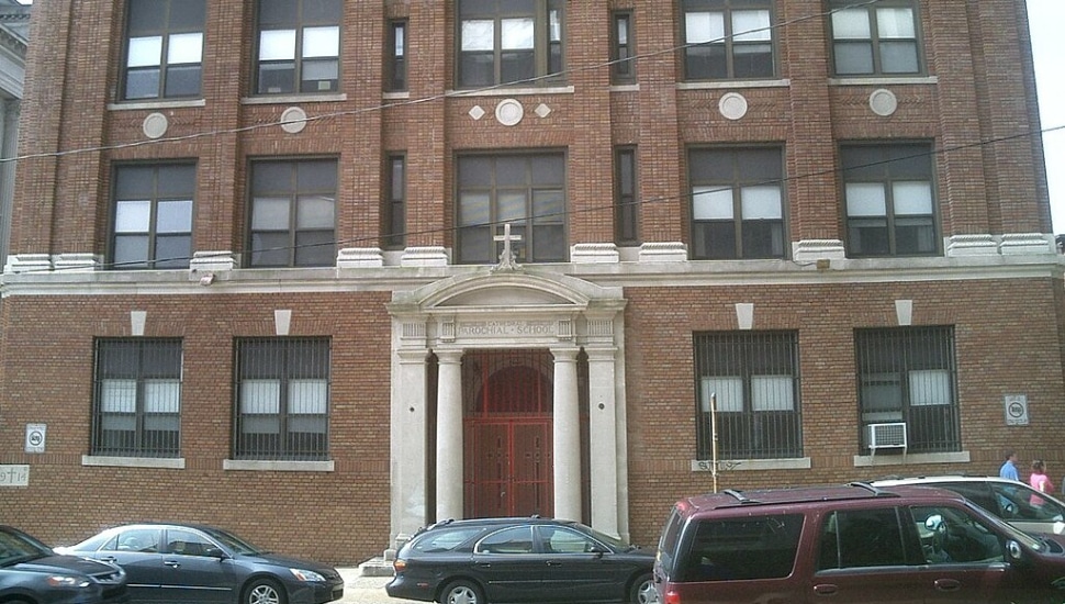 Hallahan Catholic Girls High was the country's first diocesan Catholic girls high school in the United States. It closed in 2021, and pending approval will become the new home of Belmont Charter High School after a $15 million purchase.