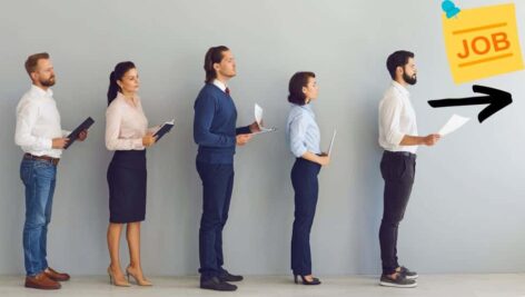 Line of people holding their resume waiting to be interviewed