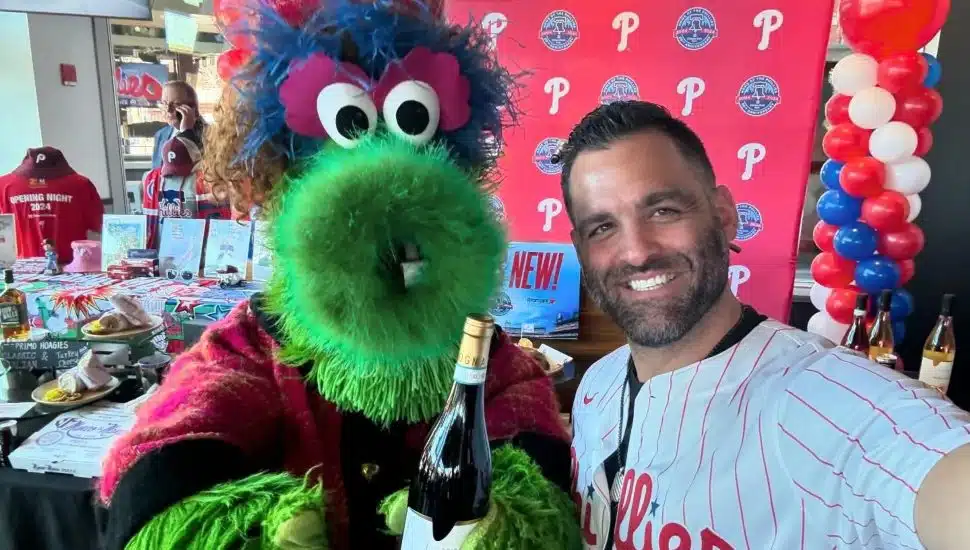 Mike Costanzo, Jr. stands with Phoebe Phanatic (the Phillies' mascot's mom) to celebrate the debut of Briganti Wines at Citizen's Bank Park.