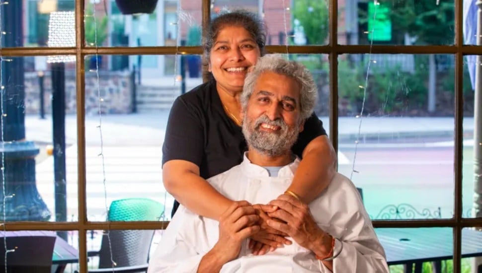 Guru's Indian Cuisine owners Ashni 'Baba' Kumar (center front) and Priya Guru (left, behind) now an all-vegetarian menu.