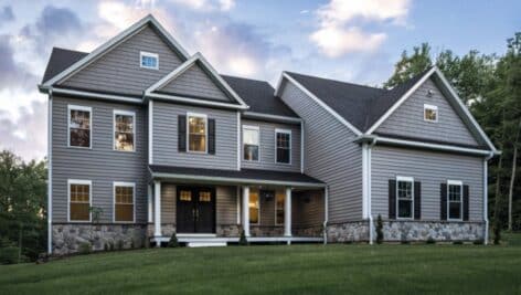 A home with new siding, roof and windows and doors.