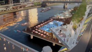 University City District has unveiled plans to build a bi-level water park on the western bank of the Schuylkill that features a large public pool, beach, and a restaurant.
