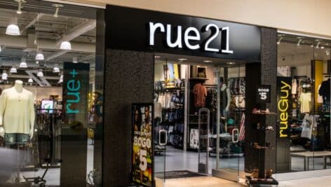 The entrance to a Rue21 mall store.