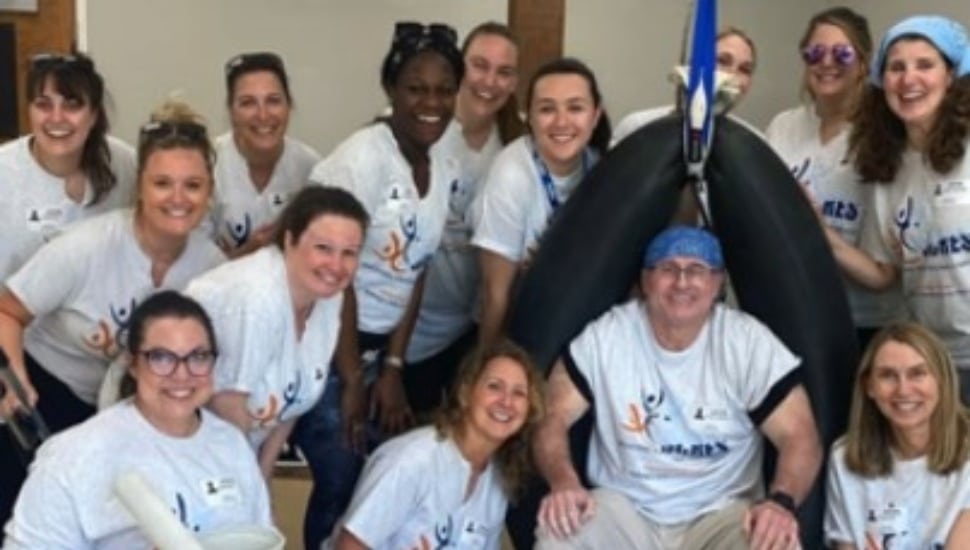 The CCRES Dream Team that did some cleaning and painting at the Timothy School in Berwyn recently.