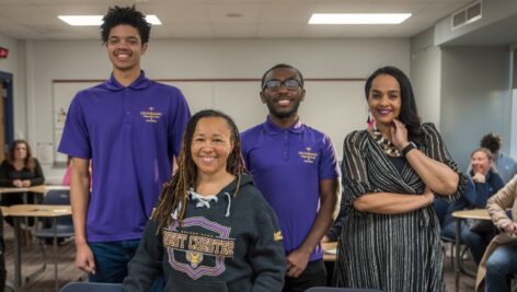 Dr. Desha Williams (center), dean of West Chester University’s College of Education and Social Work, is pictured at Plymouth Whitemarsh High School with recent WCU education graduates/former PRIZE Ambassadors Devin Davis (back row/left), Imere Williams (back row/middle), and Equity and Advancement Officer for Colonial School District Melissa Figueroa-Douglas (back row/right).