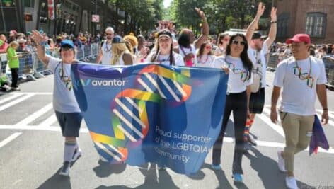 Avantor employees celebrate Pride as part of a parade.