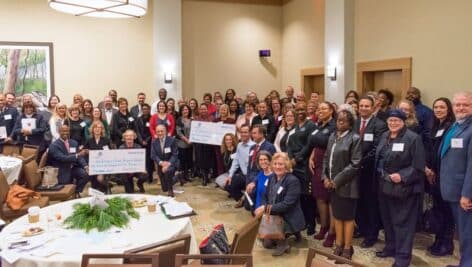 A large group of representatives from nonprofit organizations serving Delaware County.