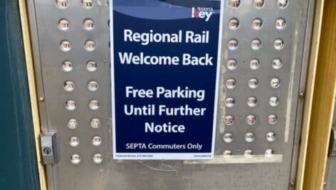 A coin slot parking kiosk in the SEPTA Wynnewood lot of the Paoli-Thorndale line.