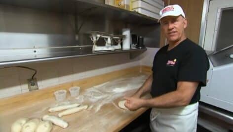 Pete Romano Jr. preps strombolis at Romano's Pizzeria and Italian Restaurant in Essington.