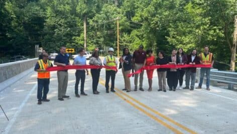 A ribbon cutting for the refurbished Manchester Avenue Bridge.