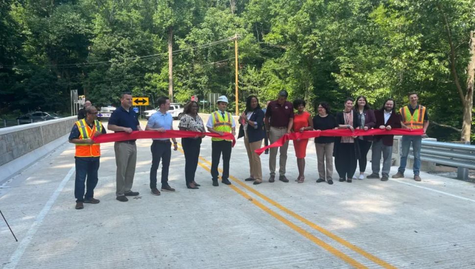 A ribbon cutting for the refurbished Manchester Avenue Bridge.