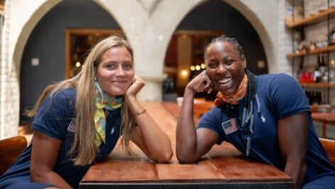 Jovana Sekulic (left) with Ashleigh Johnson during a ceremony announcing the U.S. women's water polo team for the Paris Olympics.