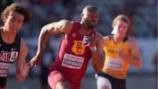 Ashton Allen (middle) is a two-time All-American and a national champion in men's 4x100 in 2022.