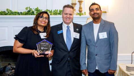 KiposTech 2024 SCORE award winners Herna Ravindran and Raj Kamal Singh with their SCORE mentor John Hess.