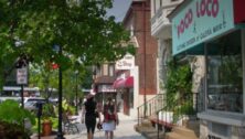 Shoppers take in the downtown shops of Swarthmore Borough.