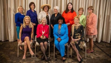 a group of past ATHENA Leadership Award winners gathered at last year's ATHENA luncheon.