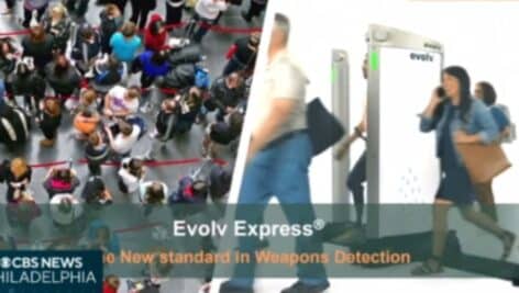 Students line up to pass through an Evolv weapons detection system.