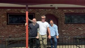 From left: Tubby Kushner, Martin Hoeger, and Michael Guagliardo in front of the Candlewyck Tavern.