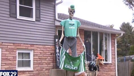 Mr. Bonejangles, a 12-foot skeleton on a Springfield home front yard, is wearing a Philadelphia Eagles outfit.