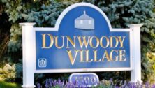 The Dunwoody Village sign at the Newtown Square entrance.