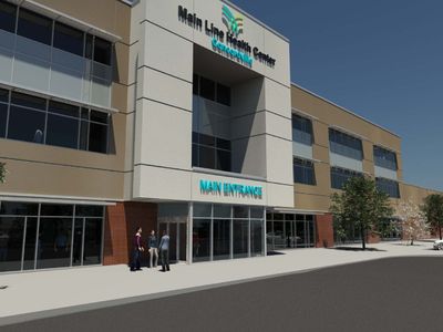 Main Line Health has announced that they have cut their yearly deficit in half, citing better paying contracts and minimizing labor costs.