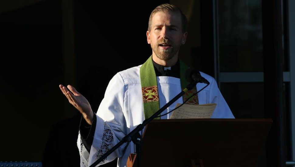 Pastor Thomas Rusert has been giving "purple" gospels recently to make sure every sermon remains neither fully political nor partisan.