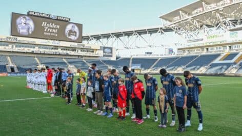 Players for the Philadelphia Union II and Crown Legacy FC honor the memory of goalkeeper Holden Trent before the start of the match at Subaru Park Oct. 26.