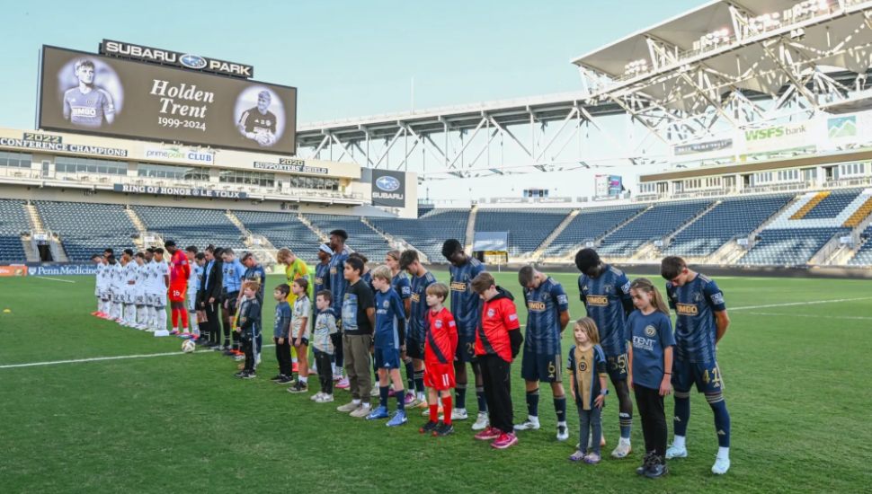 Players for the Philadelphia Union II and Crown Legacy FC honor the memory of goalkeeper Holden Trent before the start of the match at Subaru Park Oct. 26.