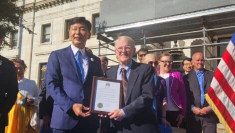 Mayors Kim Cheol-woo of Boseung, South Korea and Media Mayor Bob McMahon at a sister city signing ceremony Thursday outside the Delaware County Courthouse in Media.