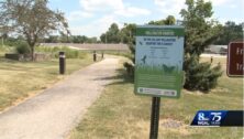 Sign announcing the Pennsylvania Turnpike's new pollinator habitats.