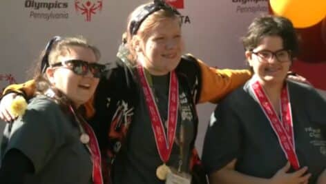 Three athletes take medals at the Special Olympics Fall Fest this past weekend at Villanova University.