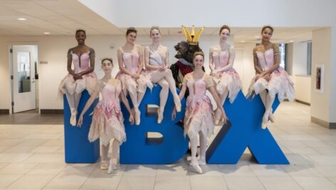 ballet performers in a promotional photo