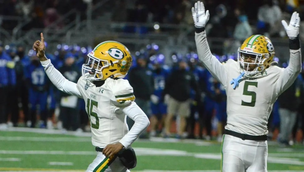 Bonner-Prendie’s Noel Campbell, left, and Mick Johnson react after Johnson scores the team's first touchdown at the PIAA Class 4A championship game.