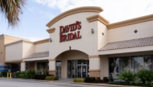 The outside entrance to a David's Bridal shop.