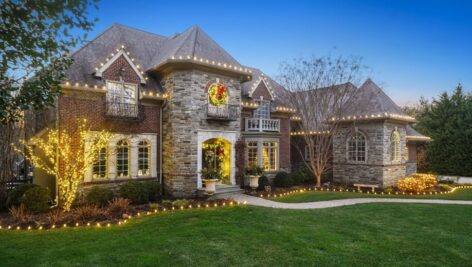 A house decorated with lights for the holidays.