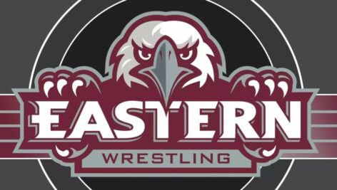 Graphic promoting new college wrestling program.