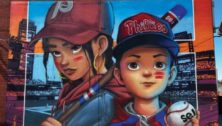 Lasst year's winning mural for Citizens Bank Park showing a boy and girl at Citizens Park in Phillies uniforms.