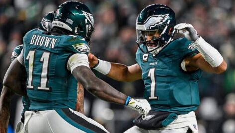 Two players for the Philadelphia Eagles out on the field during a game.