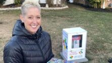 Janet Mount stands next to her Havertown puzzle exchange.