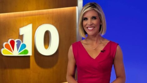 Wynnewood's Rosemary Connors stands next to the NBC 10 logo.