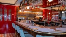 A horse-shoe-shaped bar with a pink marble bar top is the centerpiece of the newly-opened Testa Rossa in Glen Mills.