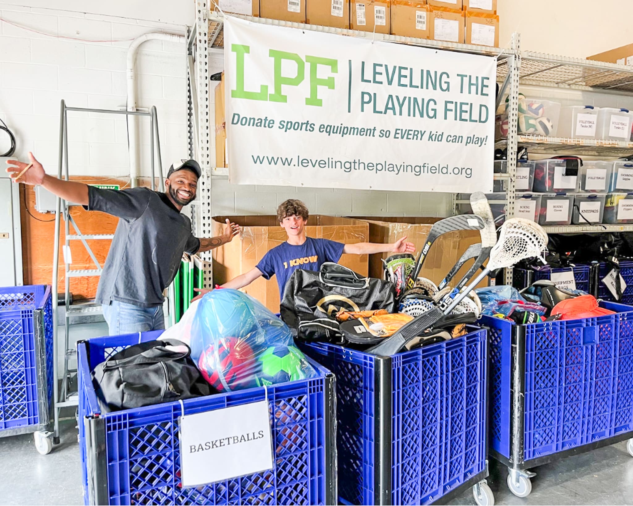 Level the Playing Field sets up tables of donated sports equipment.