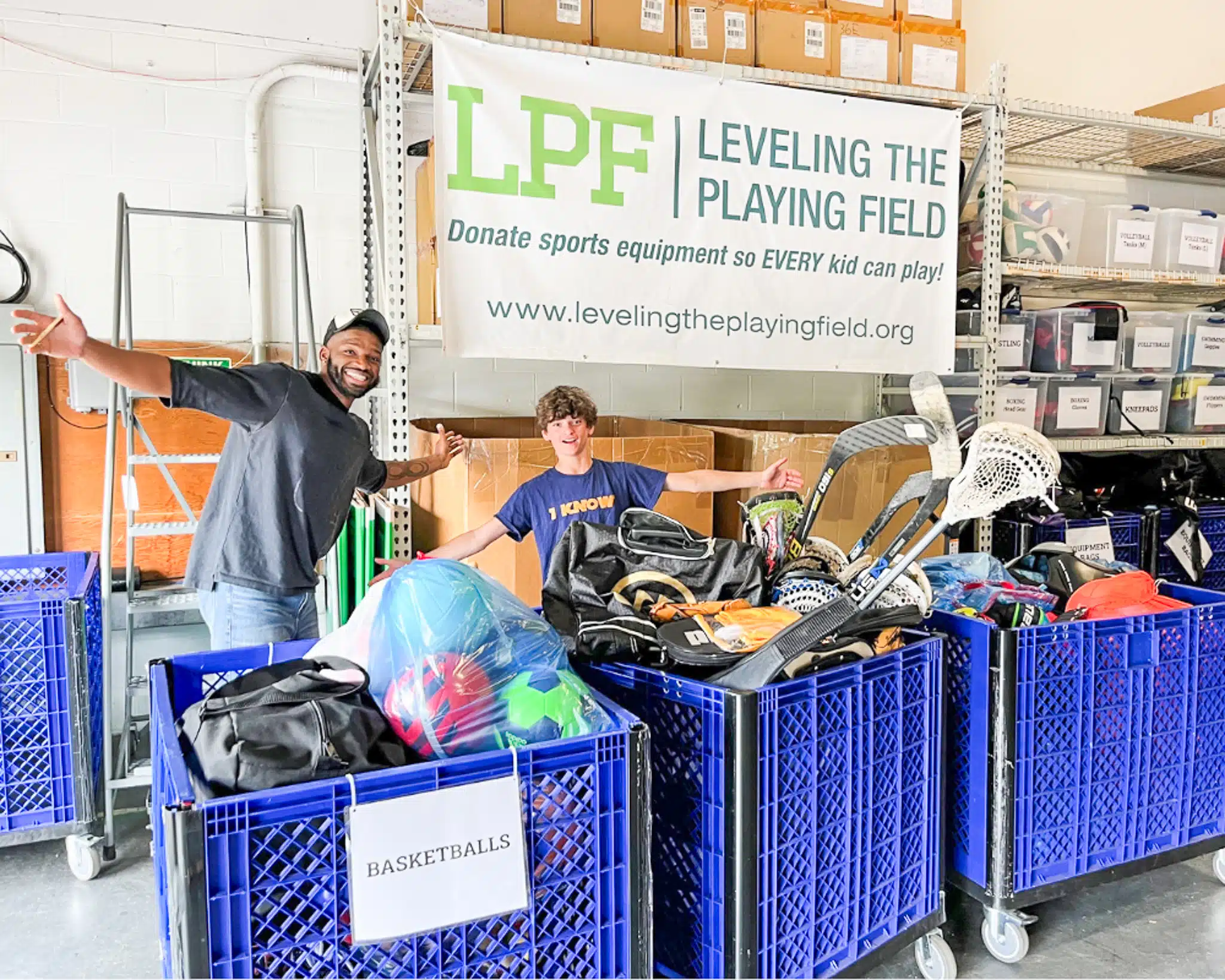 Level the Playing Field sets up tables of donated sports equipment.