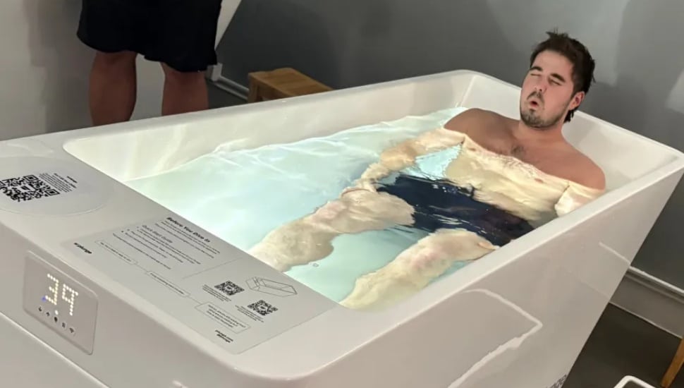 A customer experiences cold water immersion at Cold Plunge Philly in Havertown.