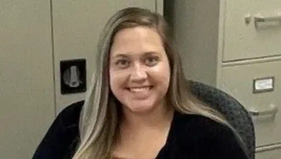 Erica Braunlinger sitting at desk