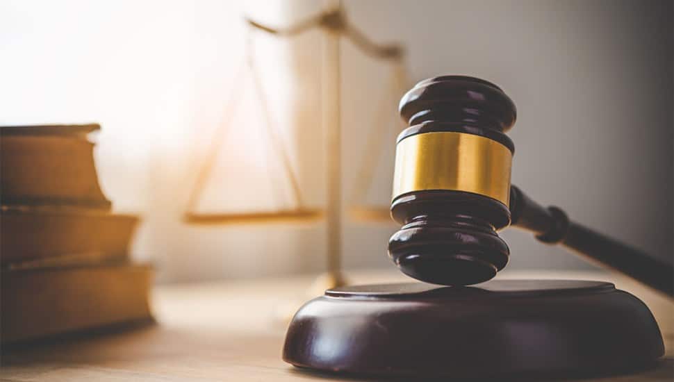 Close up view of a gavel in the courtroom.
