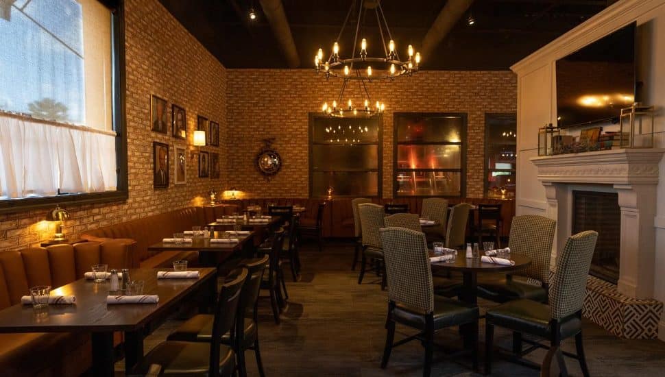 A nighttime interior of a restaurant.