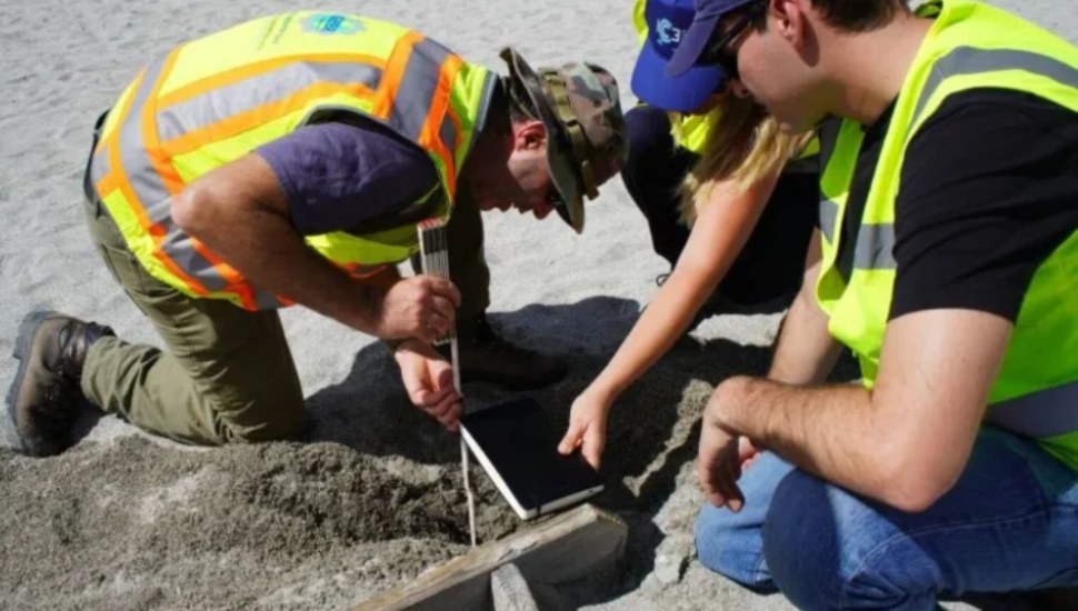 Jonathan Hubler, PhD, collects hurricane impact data in Florida.